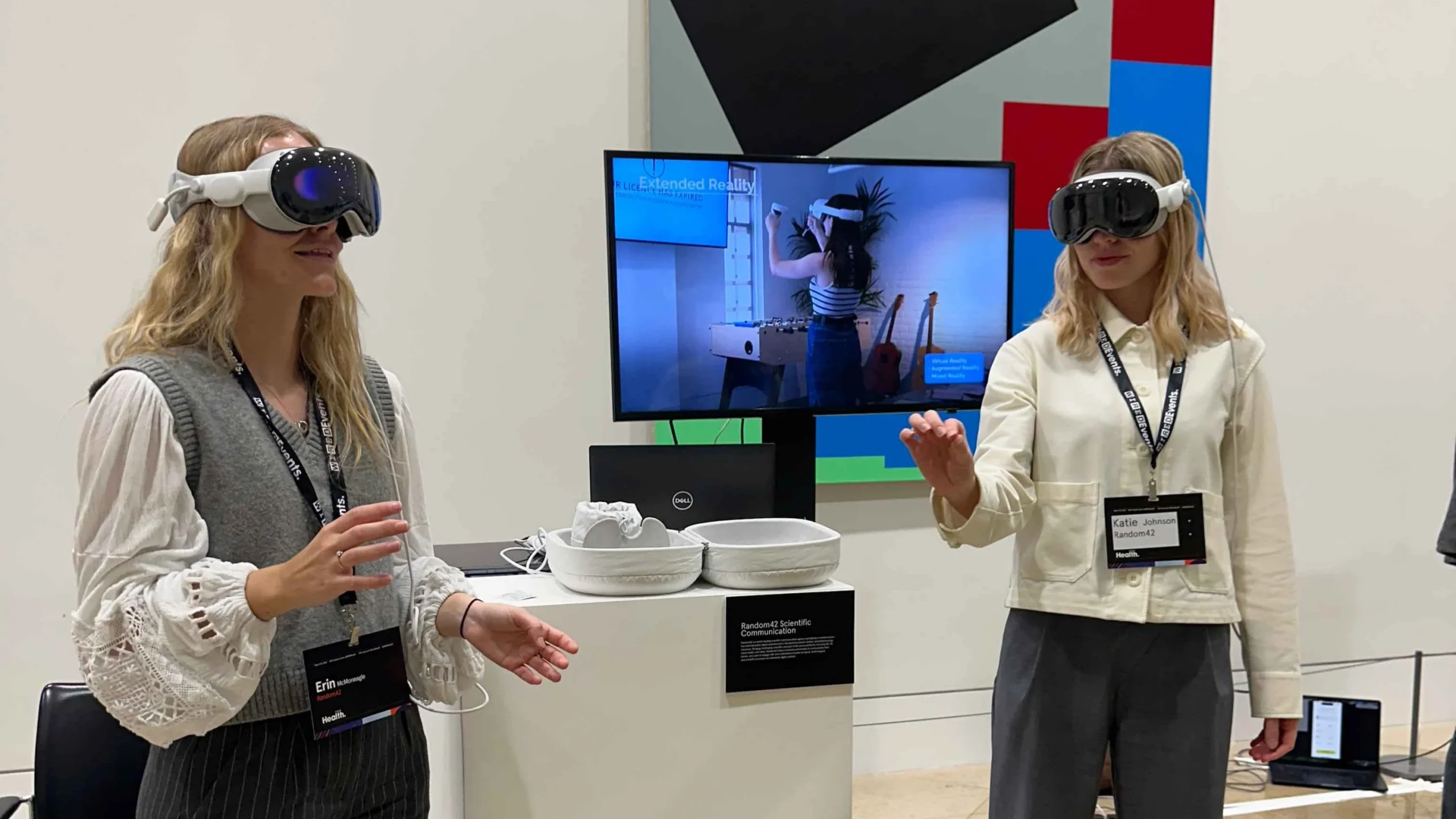Two people wearing the Apple Vision Pro headsets at WIRED Health